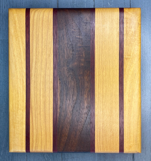 8” x 8.5”* Maple, Walnut, Cherry & Purple Heart Cutting Board