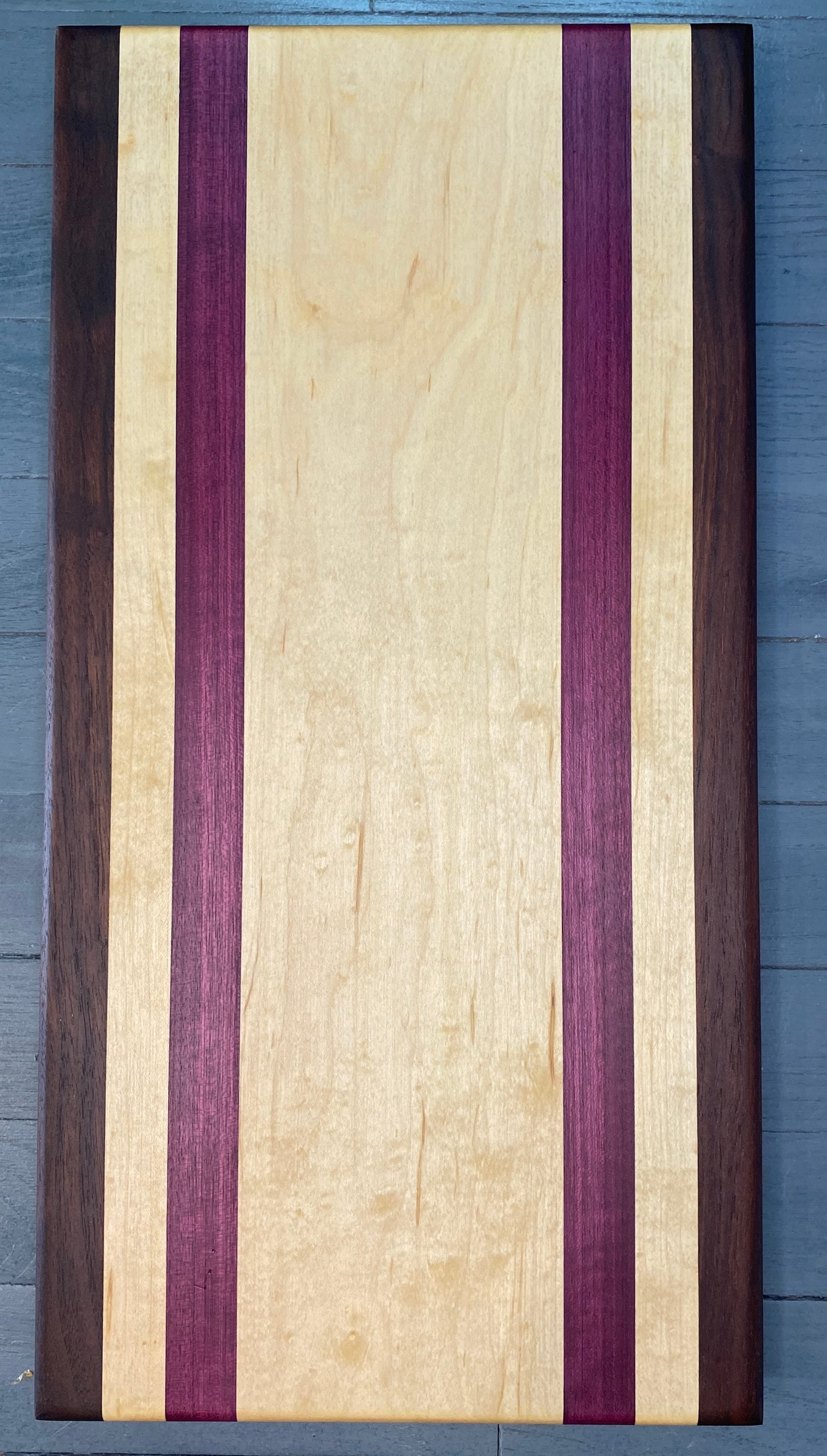 9.5” x 18”* Maple, Walnut & Purple Heart Cutting Board