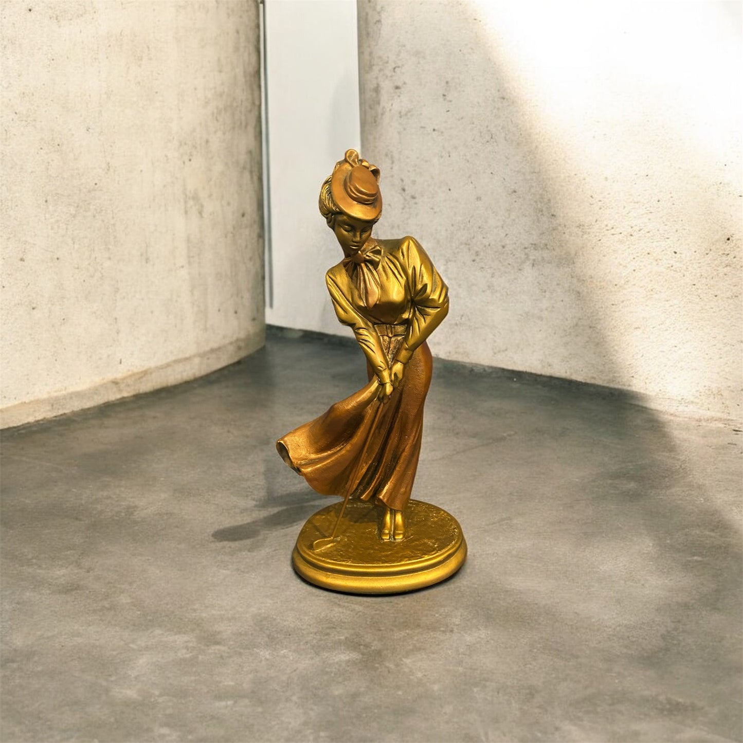 Alexsander Danel (Estonian, 1940 – 2001) Patinated Bronze Sculpture “Golf Playing Lady in 1920s Outfit”