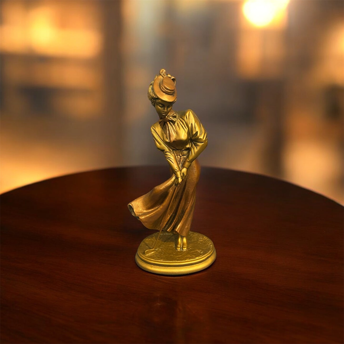 Alexsander Danel (Estonian, 1940 – 2001) Patinated Bronze Sculpture “Golf Playing Lady in 1920s Outfit”